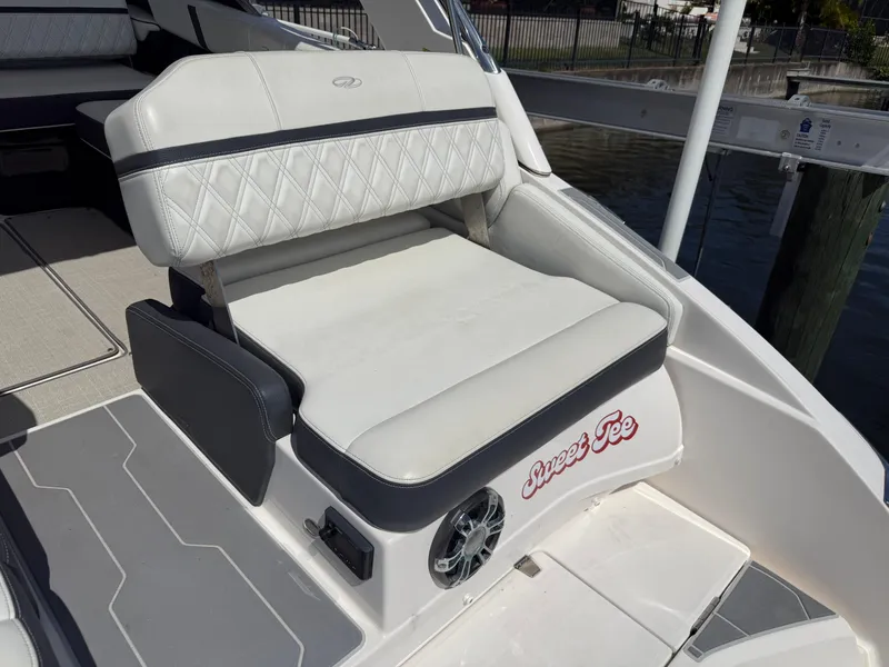 Slide: The Image of 2020 Regal 29 OBX boat seat with "Sweet Tee" text, featuring diamond-pattern upholstery. - 33