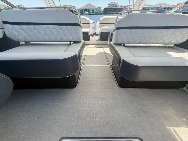 Slide: The Image of 2020 Regal 29 OBX boat interior with spacious seating and modern design. - 38