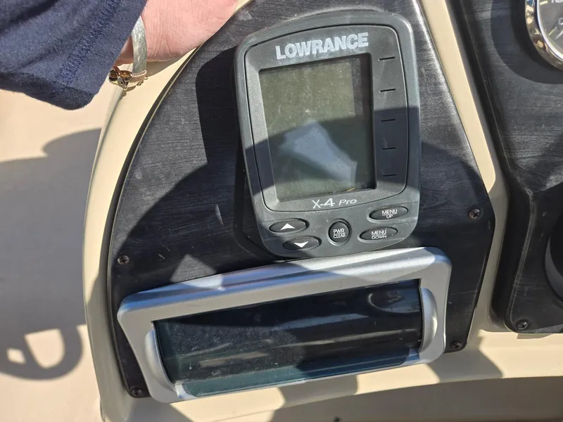 Slide: The Image of Console of a 2014 Sweetwater 2086 boat with Lowrance X-4 Pro fish finder. - 13