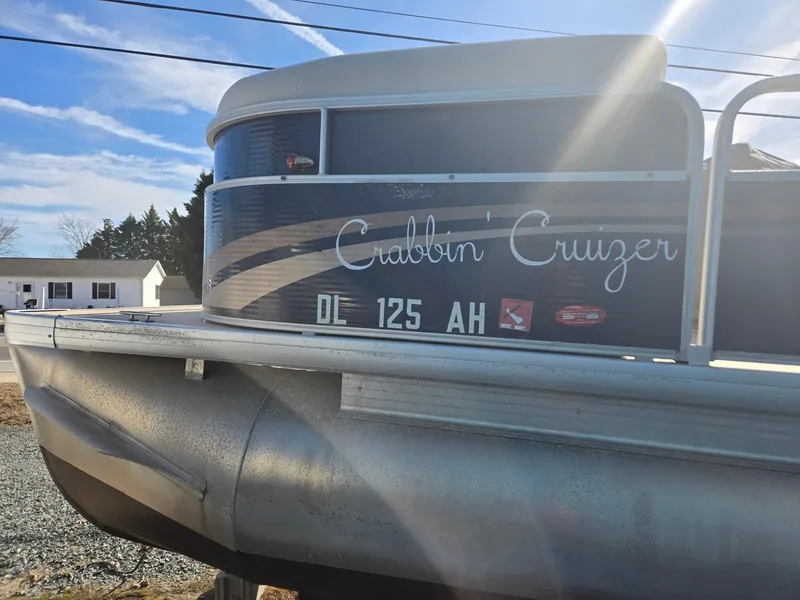 Slide: The Image of 2014 Sweetwater 2086 pontoon boat named "Crabbin' Cruizer" with registration DL 125 AH. - 4