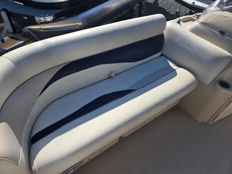Slide: The Image of Cream and navy seating on 2014 Sweetwater 2086 boat, showcasing elegant design. - 7