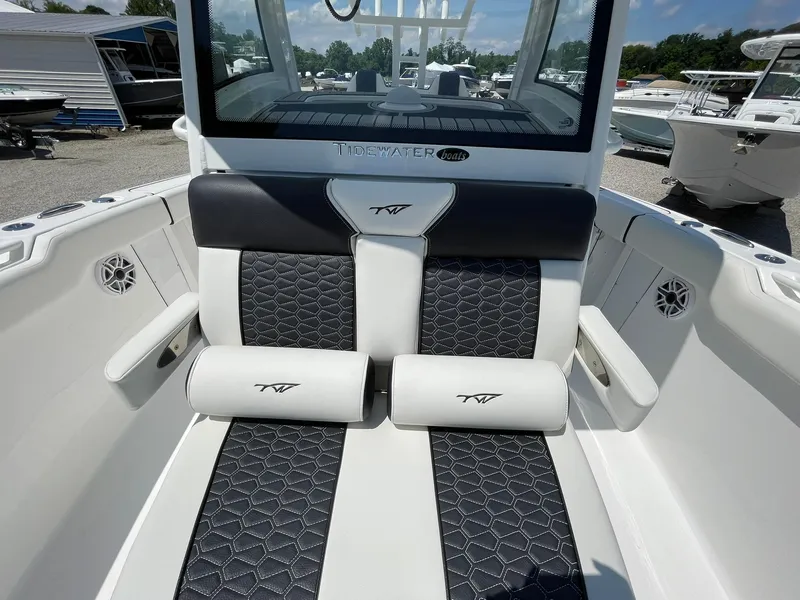 Slide: The Image of 2026 Tidewater 302 CC Adventure boat interior with stylish seating and modern design. - 27