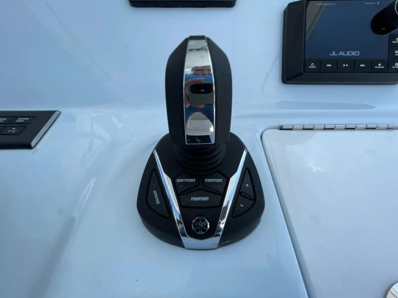 Slide: The Image of Joystick control on 2026 Tidewater 302 CC Adventure boat dashboard. - 39