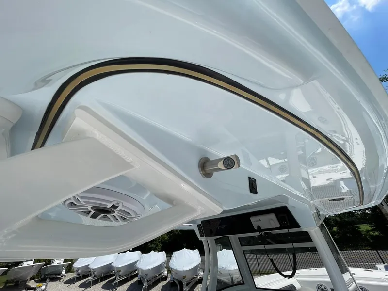 Slide: The Image of 2026 Tidewater 302 CC Adventure boat, featuring sleek design and modern equipment. - 48