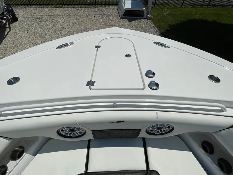 Slide: The Image of 2026 Tidewater 302 CC Adventure boat deck with sleek design and modern features. - 5