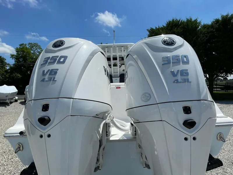 Slide: The Image of Twin Yamaha 350 V6 outboard engines on a 2026 Tidewater 302 CC Adventure boat. - 66