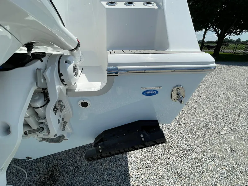 Slide: The Image of 2026 Tidewater 302 CC Adventure boat stern with motor mount and ABYC certification. - 68