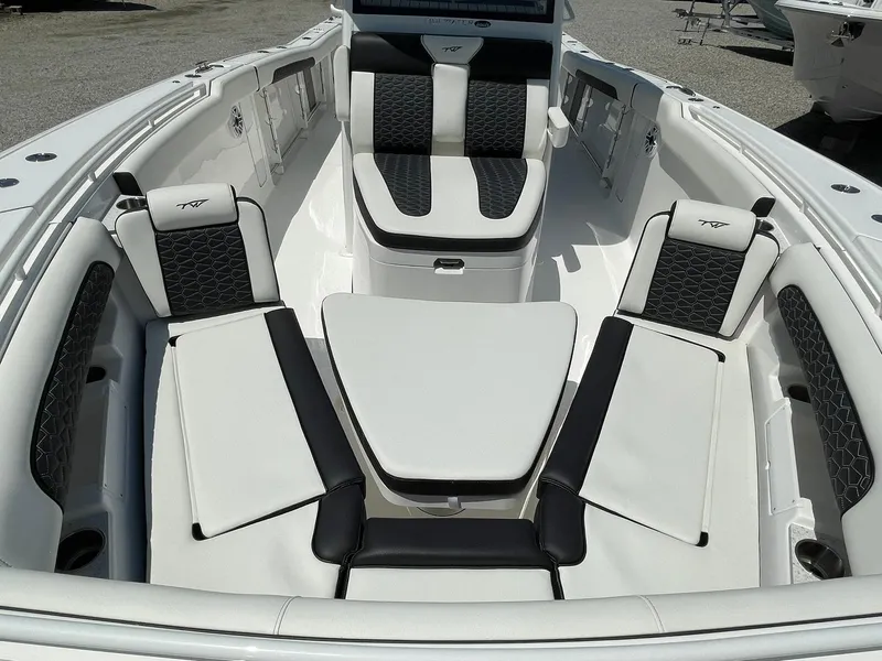 Slide: The Image of 2026 Tidewater 302 CC Adventure boat interior with stylish seating and modern design. - 7