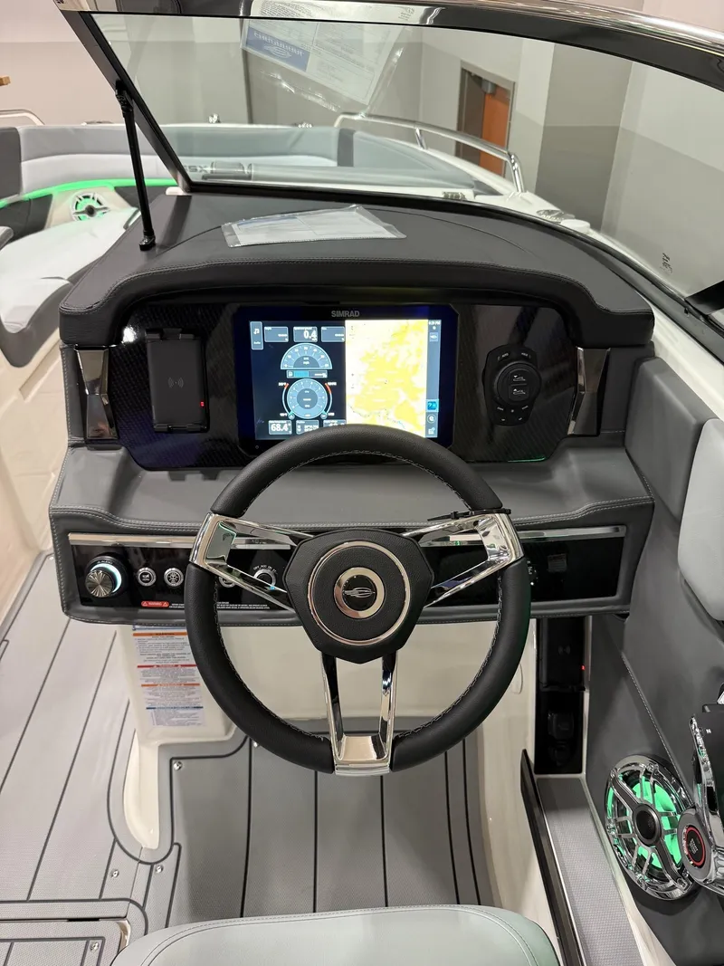 Slide: The Image of Engine compartment of 2025 Chaparral 2870 SSX boat, featuring a powerful V8 engine. - 11