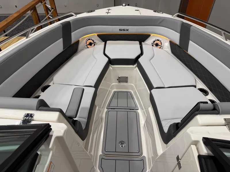 The Image of 2025 Chaparral 2870 SSX boat on trailer at Hern Marine dealership. - 2