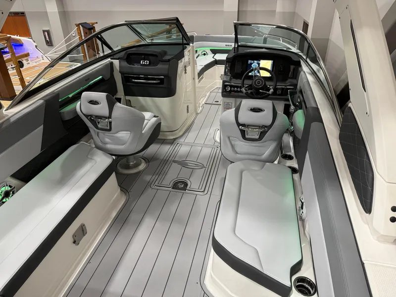 Slide: The Image of 2025 Chaparral 2870 SSX boat interior with luxurious seating and modern design. - 4