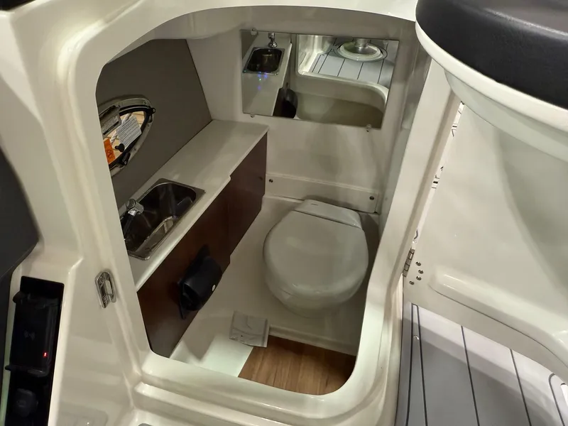 Slide: The Image of 2025 Chaparral 2870 SSX boat interior with sleek design and modern features. - 9