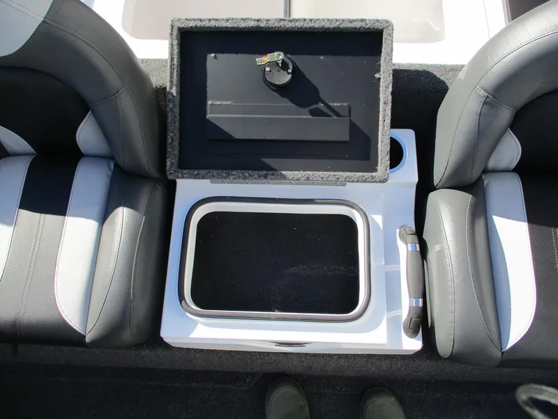 Slide: The Image of 2025 Vexus AVX 1980 boat interior with storage compartment and seating. - 10