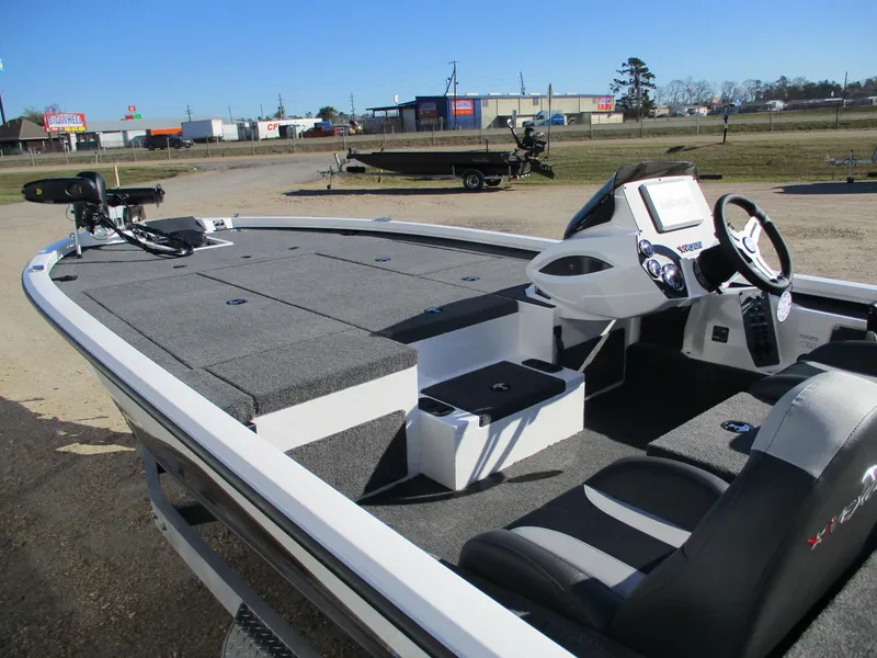 Slide: The Image of 2025 Vexus AVX 1980 boat with modern dashboard and spacious deck. - 3