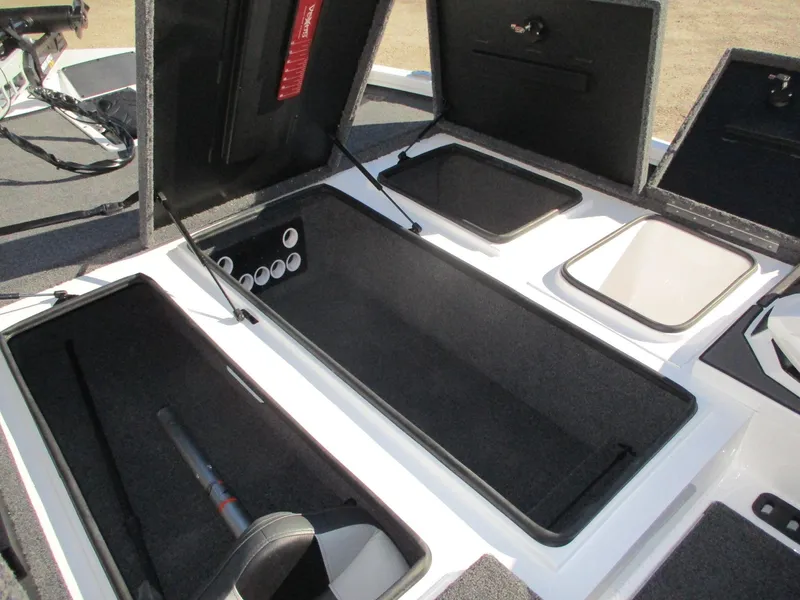 Slide: The Image of 2025 Vexus AVX 1980 boat storage compartments open, showcasing spacious interior design. - 7