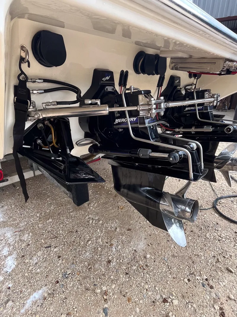 Slide: The Image of 1998 Fountain 38 Fever boat with dual Mercury outboard engines, rear view. - 10