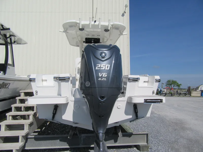 Slide: The Image of 2025 Parker 2200 Center Console boat with Yamaha 250 V6 engine, displayed outdoors. - 11