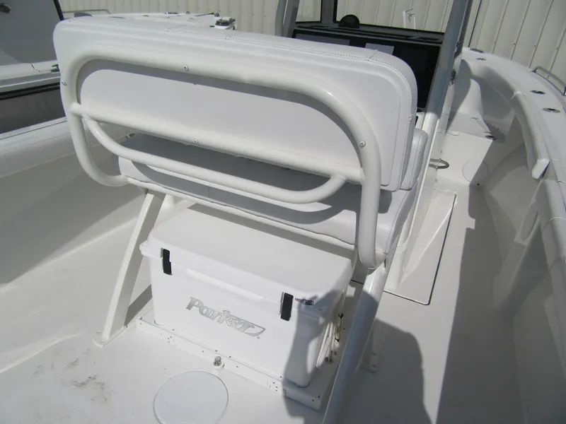 Slide: The Image of 2025 Parker 2200 Center Console boat interior with seating and storage. - 4