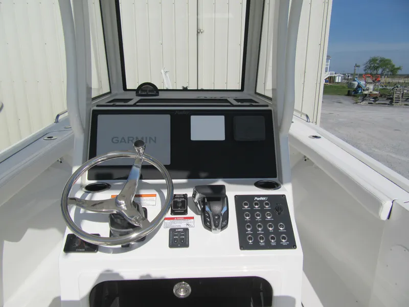 Slide: The Image of 2025 Parker 2200 Center Console boat dashboard with Garmin navigation system. - 5