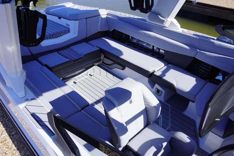 Slide: The Image of 2025 Nautique Super Air Nautique G25 interior with luxurious seating and modern design. - 10