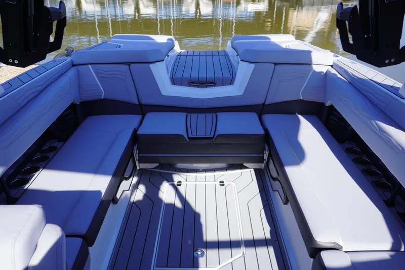 Slide: The Image of 2025 Nautique Super Air Nautique G25 interior with spacious seating and modern design. - 6