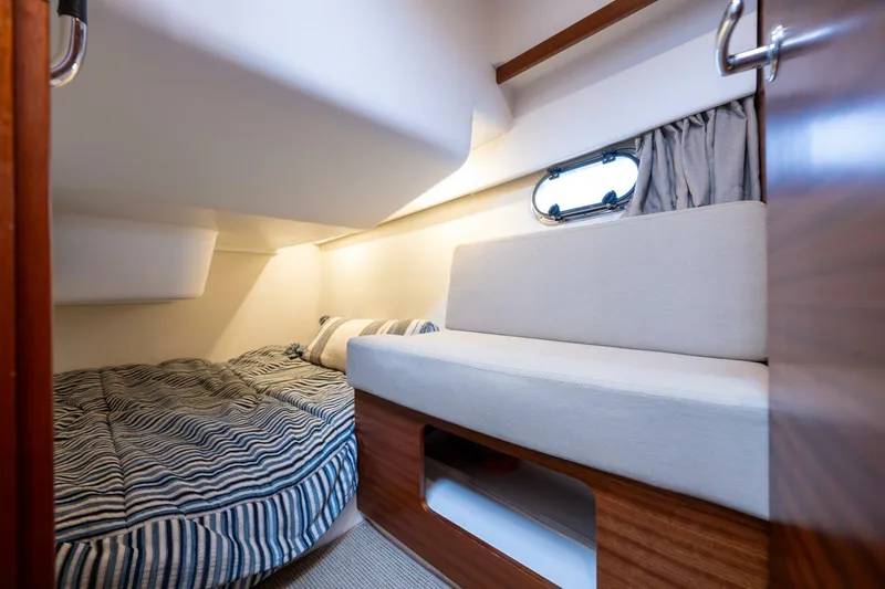 Slide: The Image of Interior cabin of 2019 Nimbus 365 Coupe with bed and seating area. - 20