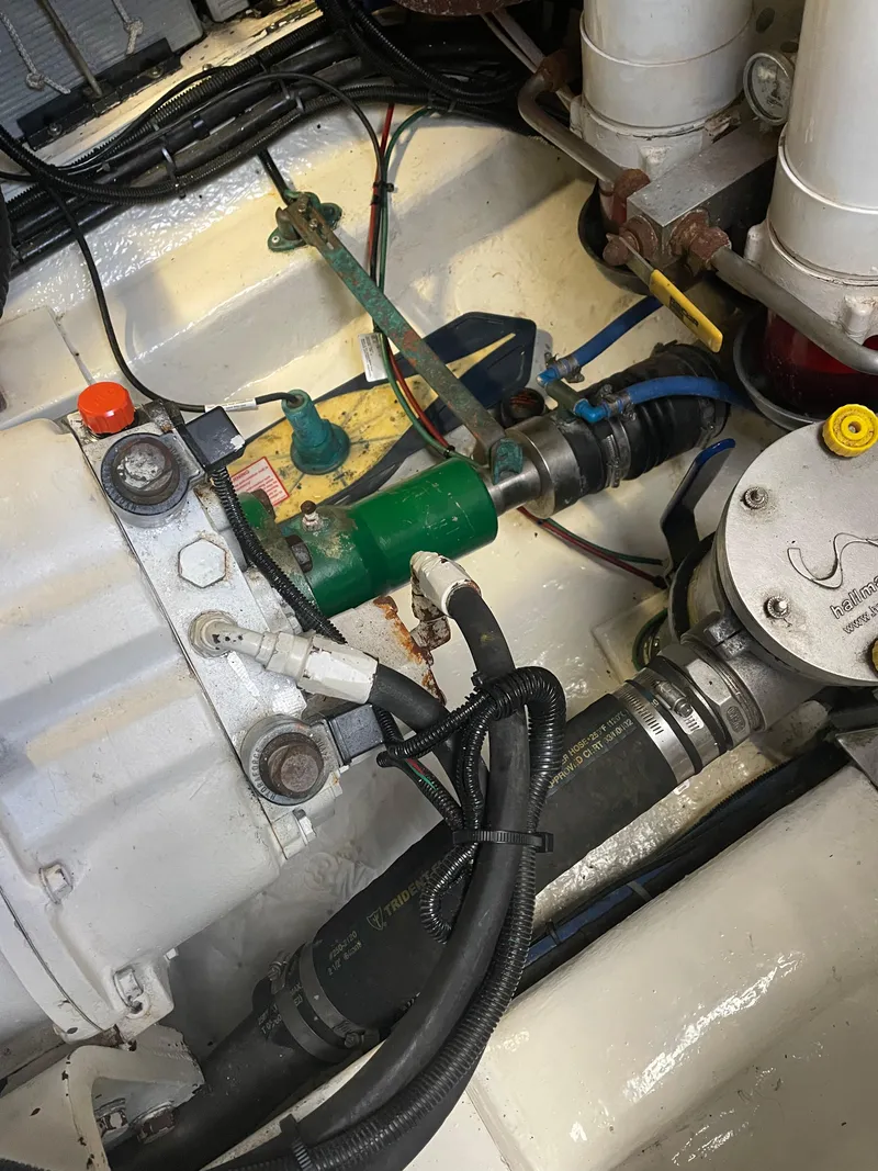 Slide: The Image of Engine compartment of a 2005 Riviera 47 Open Flybridge Series II yacht. - 13