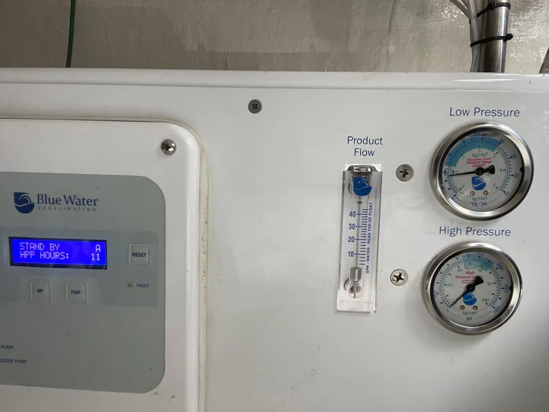 Slide: The Image of Control panel of a Blue Water desalination system on a 2005 Riviera 47 Open Flybridge. - 14