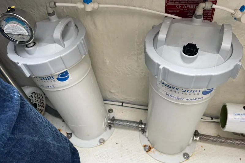 Slide: The Image of Water filtration system in 2005 Riviera 47 Open Flybridge Series II yacht. - 22
