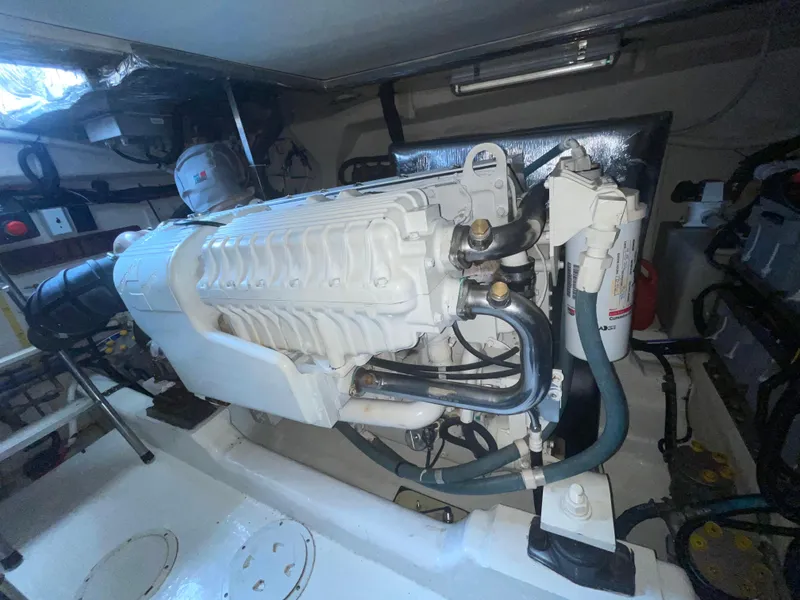 Slide: The Image of Engine room of 2005 Riviera 47 Open Flybridge Series II yacht. - 28
