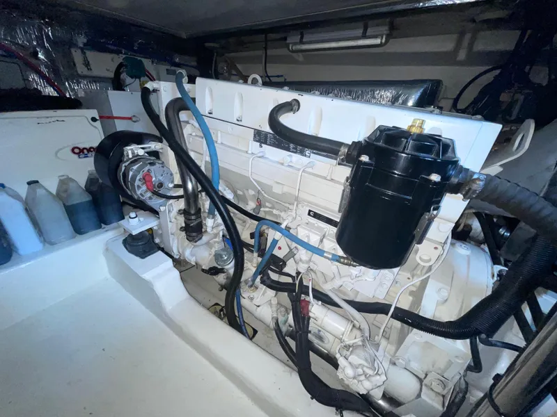 Slide: The Image of Engine room of 2005 Riviera 47 Open Flybridge Series II yacht. - 29