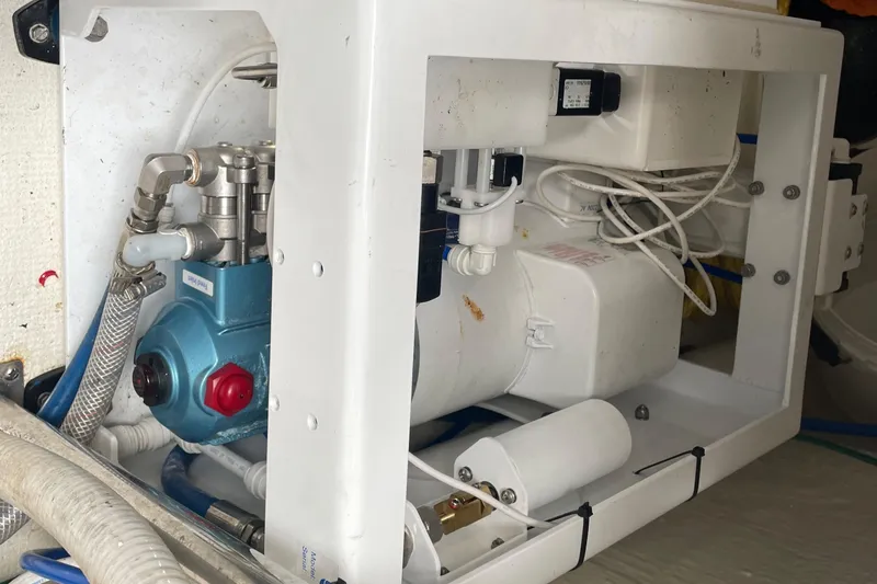 Slide: The Image of Engine compartment of 2005 Riviera 47 Open Flybridge Series II yacht. - 31