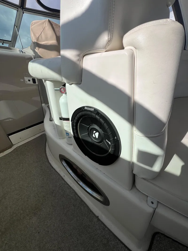 Slide: The Image of 2001 Sea Ray 340 Sundancer interior with speaker and seating detail. - 17