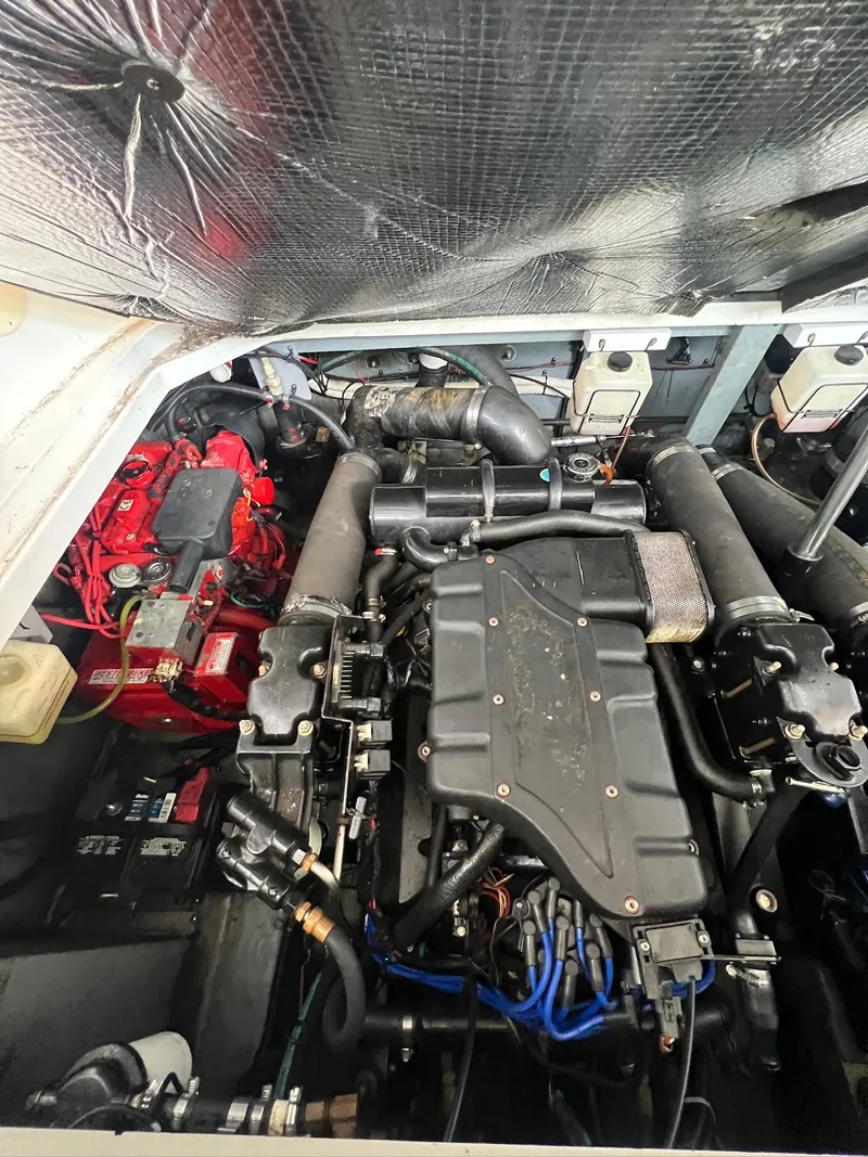 Slide: The Image of Engine compartment of a 2001 Sea Ray 340 Sundancer boat. - 32