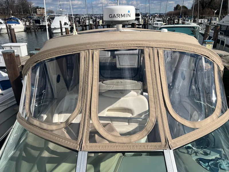 Slide: The Image of 2001 Sea Ray 340 Sundancer with Garmin radar, docked at a marina. - 39