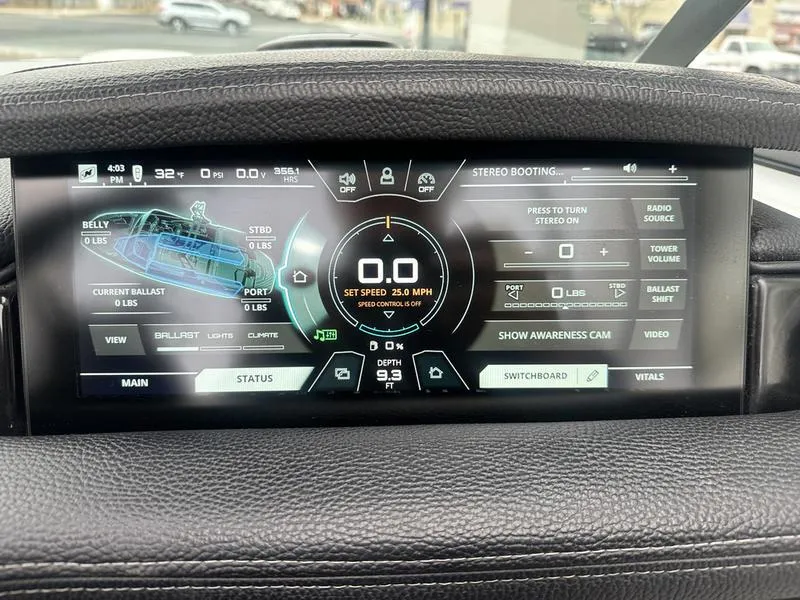 Slide: The Image of Dashboard display of a 2019 Nautique Super Air Nautique GS22 boat. - 14