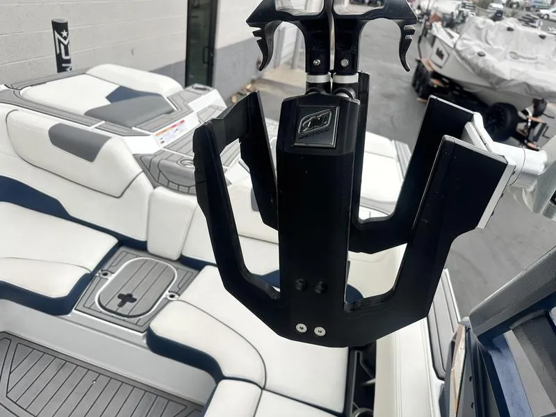 Slide: The Image of 2019 Nautique Super Air Nautique GS22 interior with wakeboard rack. - 15