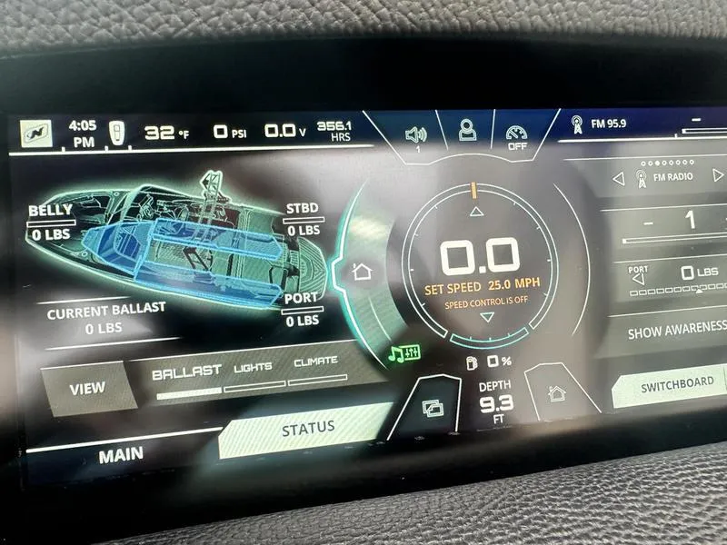 Slide: The Image of Dashboard of 2019 Nautique Super Air Nautique GS22 boat, displaying speed and ballast settings. - 17