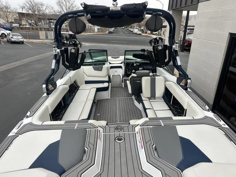 Slide: The Image of 2019 Nautique Super Air Nautique GS22 interior with sleek seating and advanced features. - 7