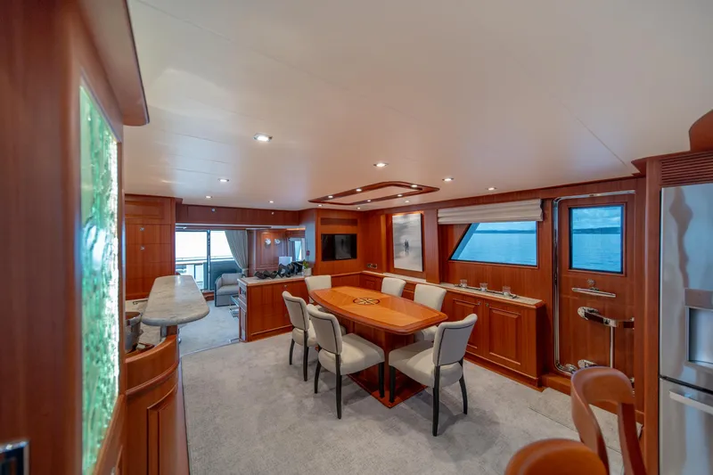 Slide: The Image of Luxurious interior of 2022 Hampton Endurance 750 LRC yacht with elegant dining area. - 10