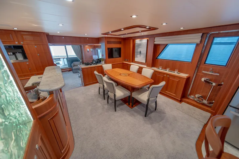 Slide: The Image of Luxurious interior of 2022 Hampton Endurance 750 LRC yacht with elegant dining area. - 11