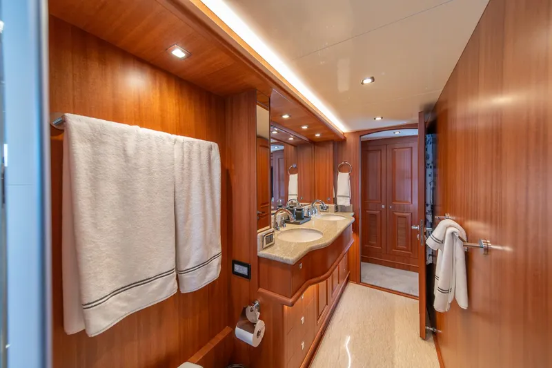 Slide: The Image of Luxurious bathroom interior of 2022 Hampton Endurance 750 LRC yacht with wooden finishes. - 23
