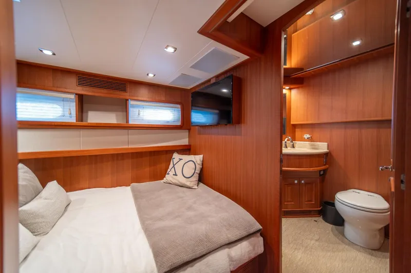 Slide: The Image of Luxurious cabin interior of 2022 Hampton Endurance 750 LRC yacht with ensuite bathroom. - 26