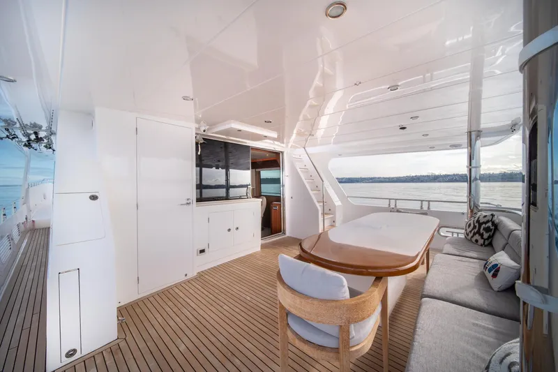 Slide: The Image of Luxurious 2022 Hampton Endurance 750 LRC yacht interior with elegant seating and ocean view. - 44