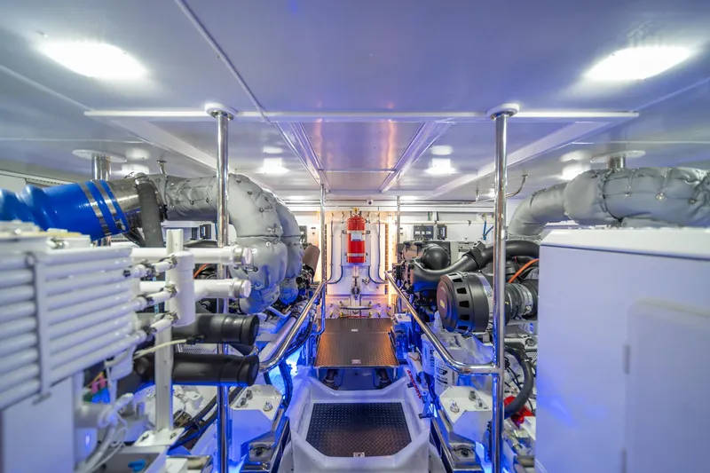 Slide: The Image of Engine room of 2022 Hampton Endurance 750 LRC yacht, featuring advanced machinery and equipment. - 47