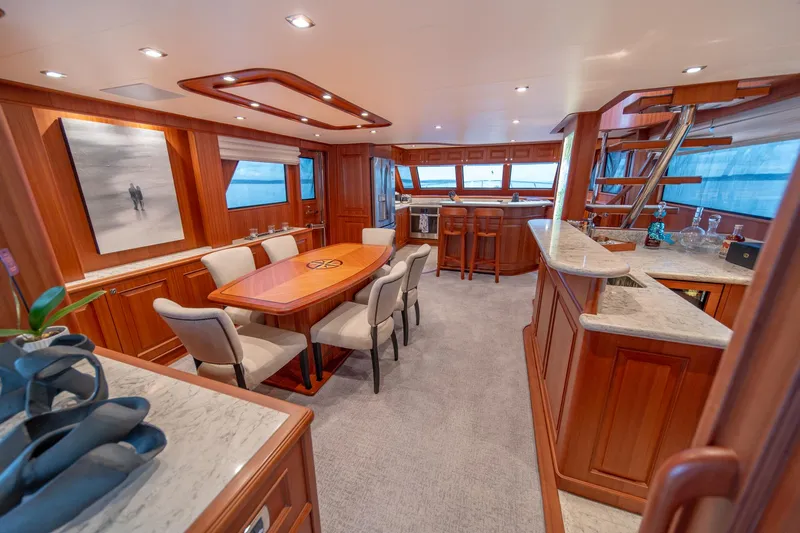 Slide: The Image of Luxurious interior of 2022 Hampton Endurance 750 LRC yacht with elegant dining area. - 7