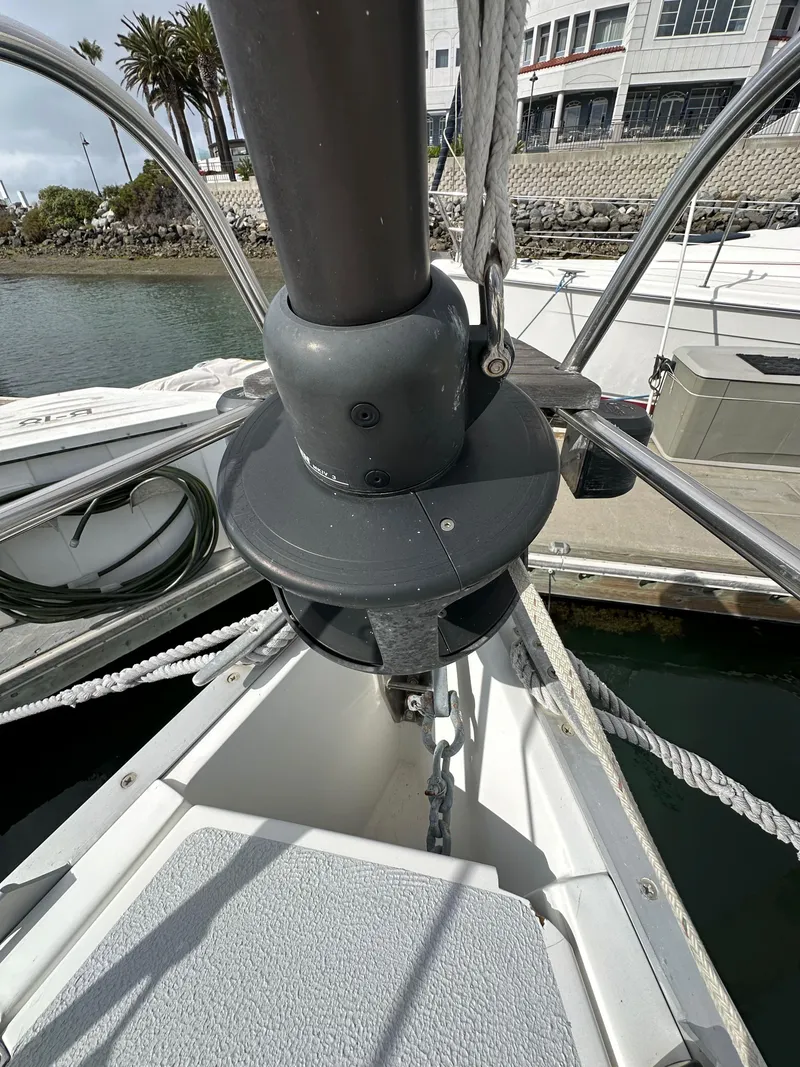 Slide: The Image of 1987 Hunter Legend 45 sailboat deck with anchor chain and winch system. - 14
