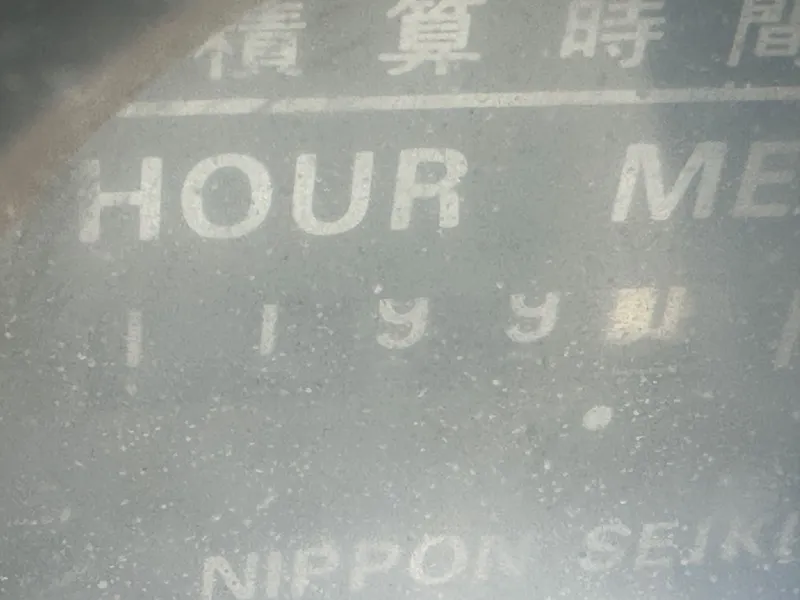 Slide: The Image of Close-up of a Hunter Legend 45 hour meter, displaying numbers and Japanese text. - 22