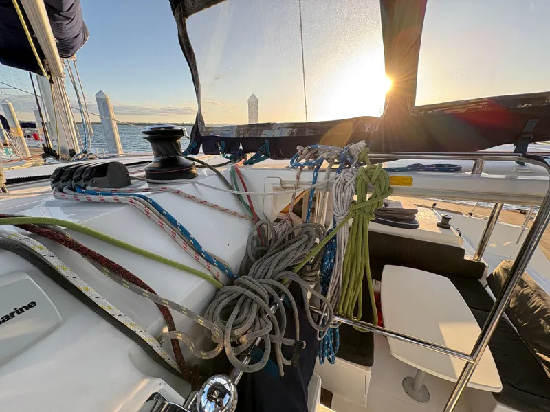 Slide: The Image of Lagoon 400 sailboat cockpit with ropes, sunset view, 2012 model. - 27