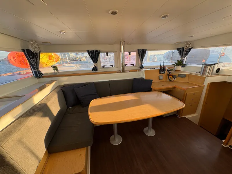 Slide: The Image of Spacious interior of 2012 Lagoon 400 catamaran with cozy seating and dining area. - 39